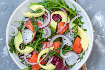 Green light salad with smoked salmon and avocado. Love for a healthy food concept