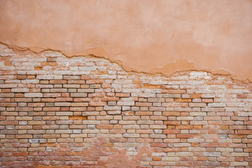 Brick wall in old city Venice Italy