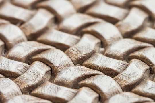 Texture of genuine brown wicker leather close-up