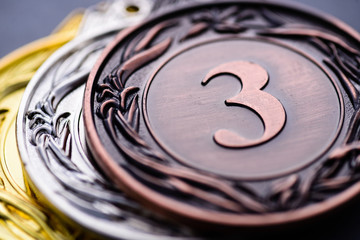 Bronze and silver winners medallions