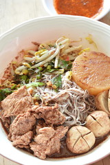 rice thin noodle with pork ball and meat in brown soup