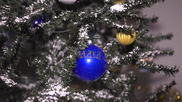 Christmas tree decorated with antique toys and garlands.