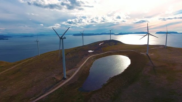 Windmills for electric power production. Arctic View Havoygavelen windmill park, Havoysund, Northern Norway Aerial footage.