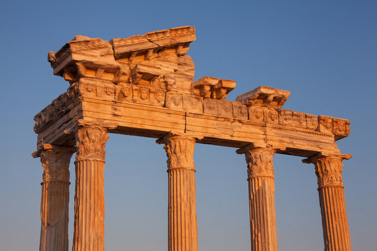 Ancient ruins of Roman Empire ( construction date about II century) at sunset.  .Apollo Temple, Side, Turkey.