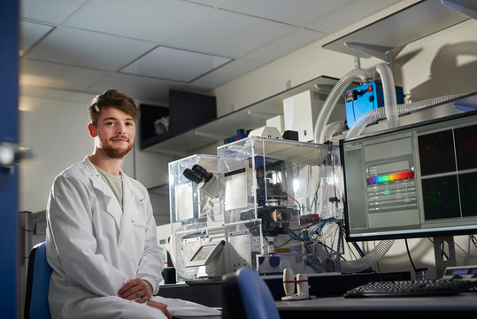 Portrait of scientist in laboratory looking at camera