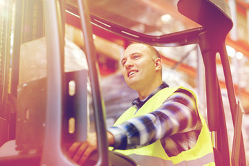 man operating forklift loader at warehouse