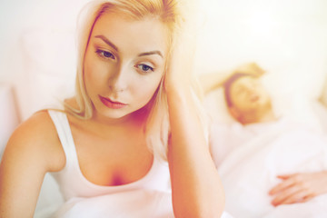 Obraz na płótnie Canvas awake woman having insomnia in bed