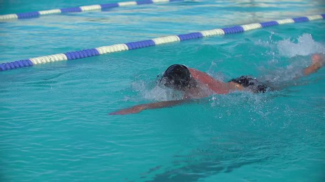 Swimmer Performing Front Crawl.