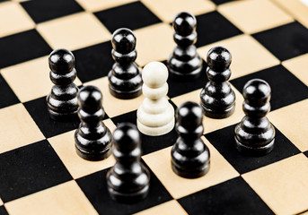 Pawn surrounded by enemies