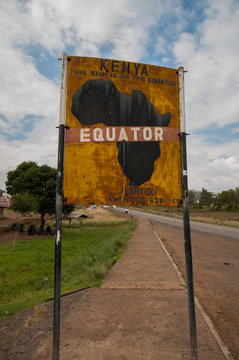 Sign marking the equator line dividing north and south hemispheres, Nanyuku, Kenya