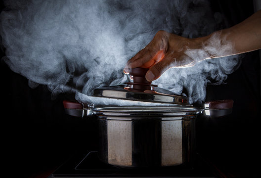 hand open hot steam pot