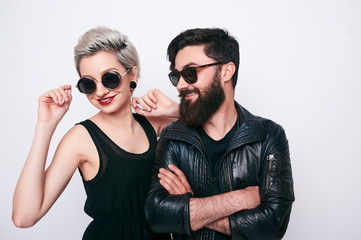 Hipster young bearded man and trendy blond woman