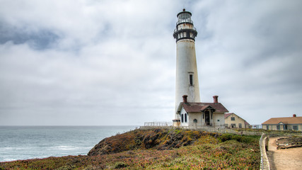 Fototapeta na wymiar PESCADERO, CALIFORNIA, UNITED STATES - September 02, 2014: Lighthouse at Pigeon Point, Coastal Highway 1 San Francisco to Los Angeles