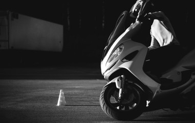 Scooter driver goes into a turn.