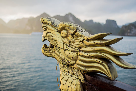 Close-up detail of dragon head on boat at sunrise, Ha Long Bay, Vietnam