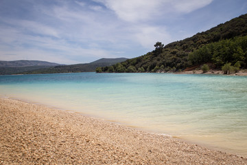 Lake gulf blue water rocky beach