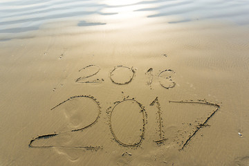Numbers 2017 on beach wave, Newyear concept