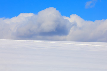 Simple winter background with blue sky