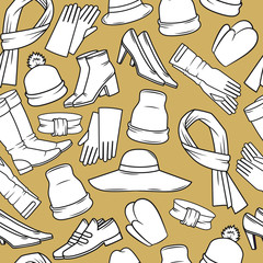 Seamless vector pattern of winter clothing. Hand Drawn clothing for autumn and winter.