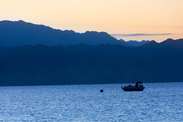 Boat at sunrise in Gulf of Aqaba