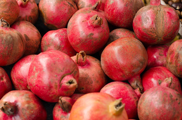 Group of pomegranates. Pomegranate closeup, background