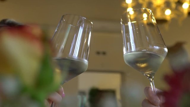 Cheers in slow motion
Shooting detail of unbrindisi in slow motion of two glasses of champagne