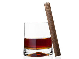 Cigar on a glass of whisky.