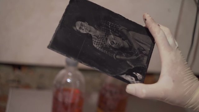 Process displays a photo with old camera close-up