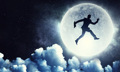 Obraz na płótnie Canvas Man and full moon . Mixed media