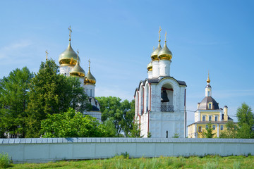 Fototapeta na wymiar At walls of the Sacred and Nikolsky Pereslavsky monastery in the sunny July afternoon. Pereslavl-Zalessky. Golden Ring of Russia