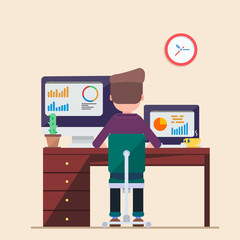 Man working on computer laptop vie. Businessman sitting  a chair at his desk with  cactus,  cup of tea,  wall clock.