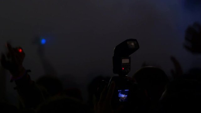4K taking picture at live music concert, festival