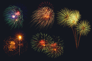 Set of colorful fireworks on black background.