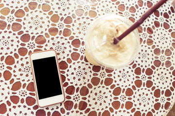 Phone and coffee with copy space