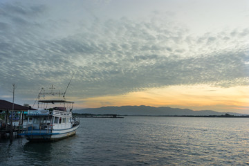 Boat with calm morning in the sea