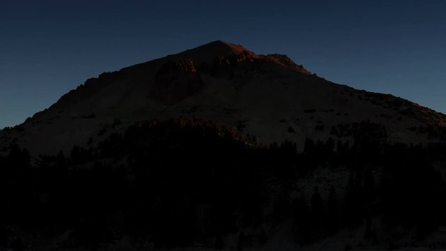 Mt. Lassen Sunrise - The sun rises on Mt. Lassen peak in Lassen National Park.
