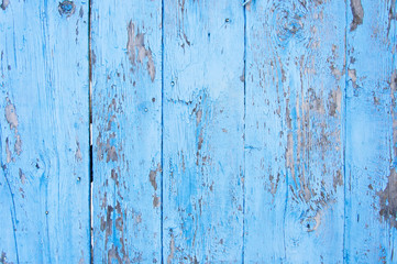 Vintage wood background with peeling paint.