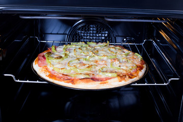 Homemade pizza in oven