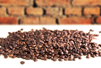 Coffee beans on wooden table
