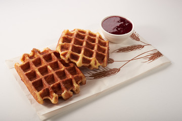 Belgian waffles and jam isolated