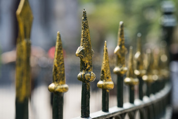 Spear point of rusty fence