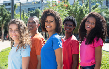 Small group of laughing young man and woman