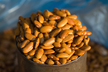 Bunch of red brown kidney beans on metal cup