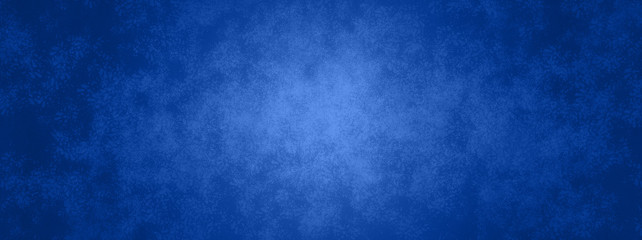 Obraz na płótnie Canvas blue background banner with metal texture design and soft center lighting