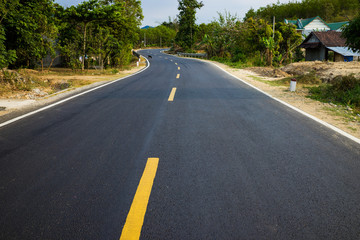 Infinity curved road with yellow line. Concept of adventure, travel, success...