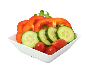 Salad of fresh vegetables In white cup on white background