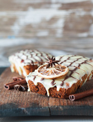 Fruitcake decorated with white and dark chocolate
