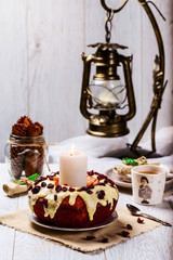 Cranberry muffin on a plate on the served table