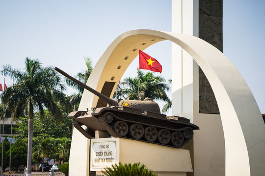 Buon Ma Thuot, Vietnam - Mar 30, 2016: Victory monument of a T-54 Tank in central point of city, crossroads of 6 roads to discover the Buon Ma Thuot city
