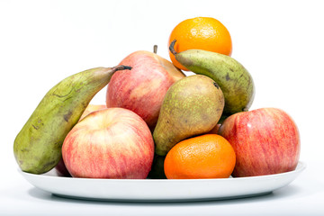 Still life of ripe fruit on a white background